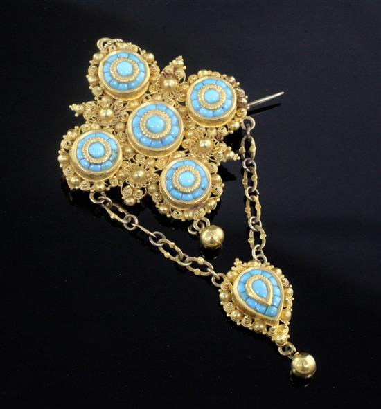 An early 20th century Indian? high carat gold and turquoise set drop brooch, 75mm.